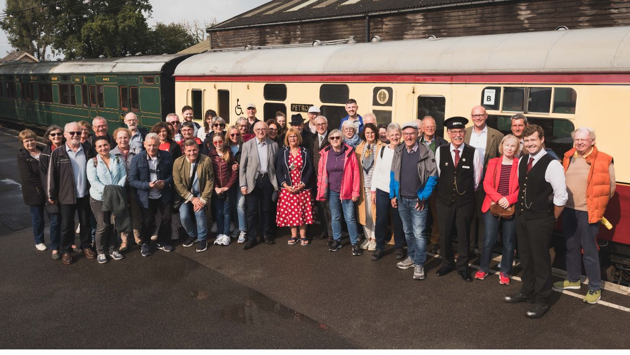 Attendees enjoying the Civic Twinning anniversary event at the Kent and East Sussex Railway, September 2024 tile