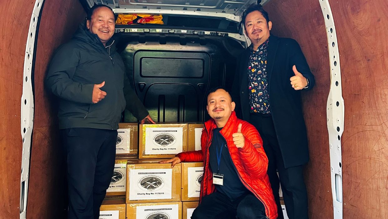 Members of the Sagarmatha Gurkha Nepalese community loading some of the 29 boxes of food they collected for the town’s FareShare Kent food bank