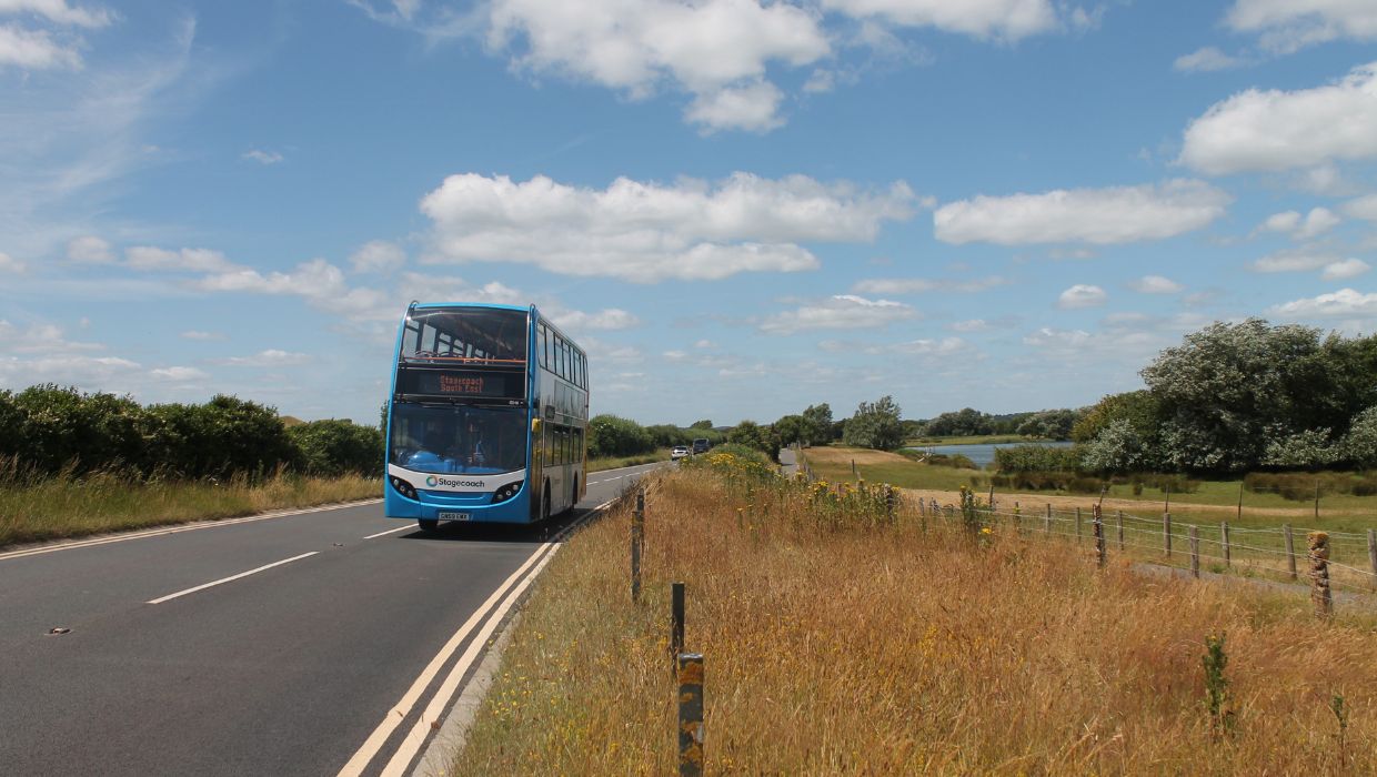 A Stagecoach South East bus on the road in Camber tile