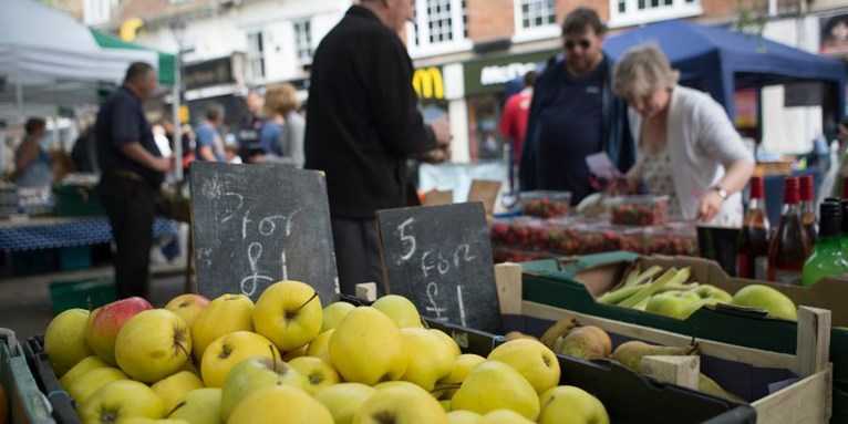 Fresh fruit and vegetables on display at a market in Ashford Town Centre