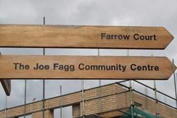 Sign pointing towards Farrow Court and The Joe Fagg Community Centre