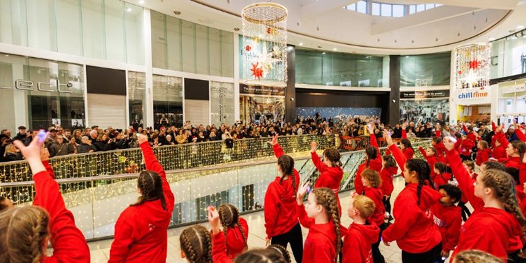 Dancers with a crowd watching