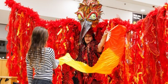 A women in a Fire Bird costume